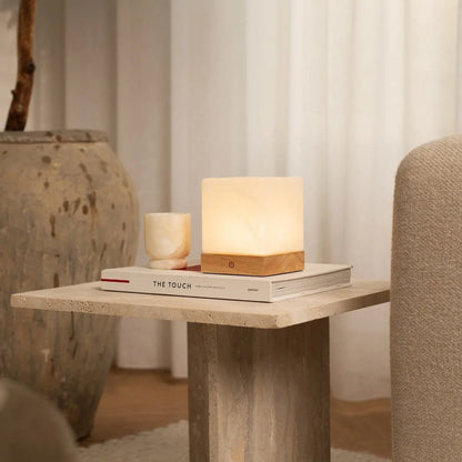 Yce Light Brown rechargeable lamp casting warm soft ambient light