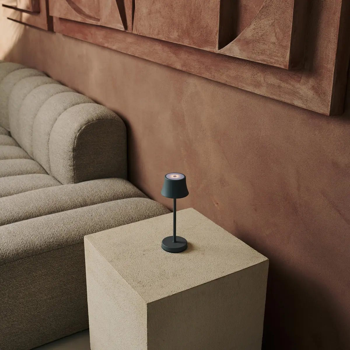 De Pijp Mini – Rechargeable Table Lamp – Stylish Mouse Grey lamp placed near modern sofa decor