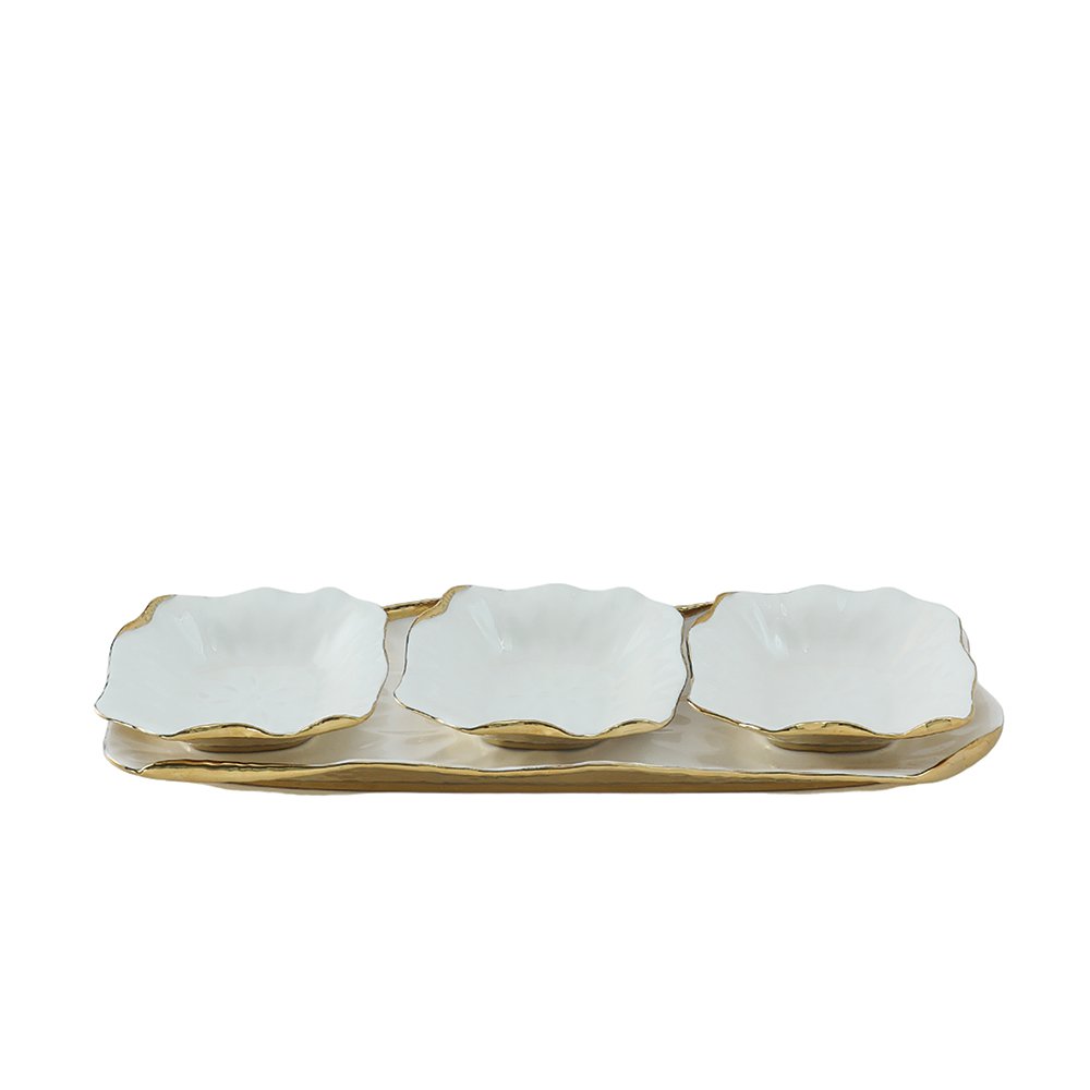Snacks set of 3 bowls on a white porcelain tray with golden edges