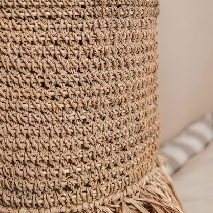Handwoven raffia pendant lamp adding cozy style to home décor by CozyVibe