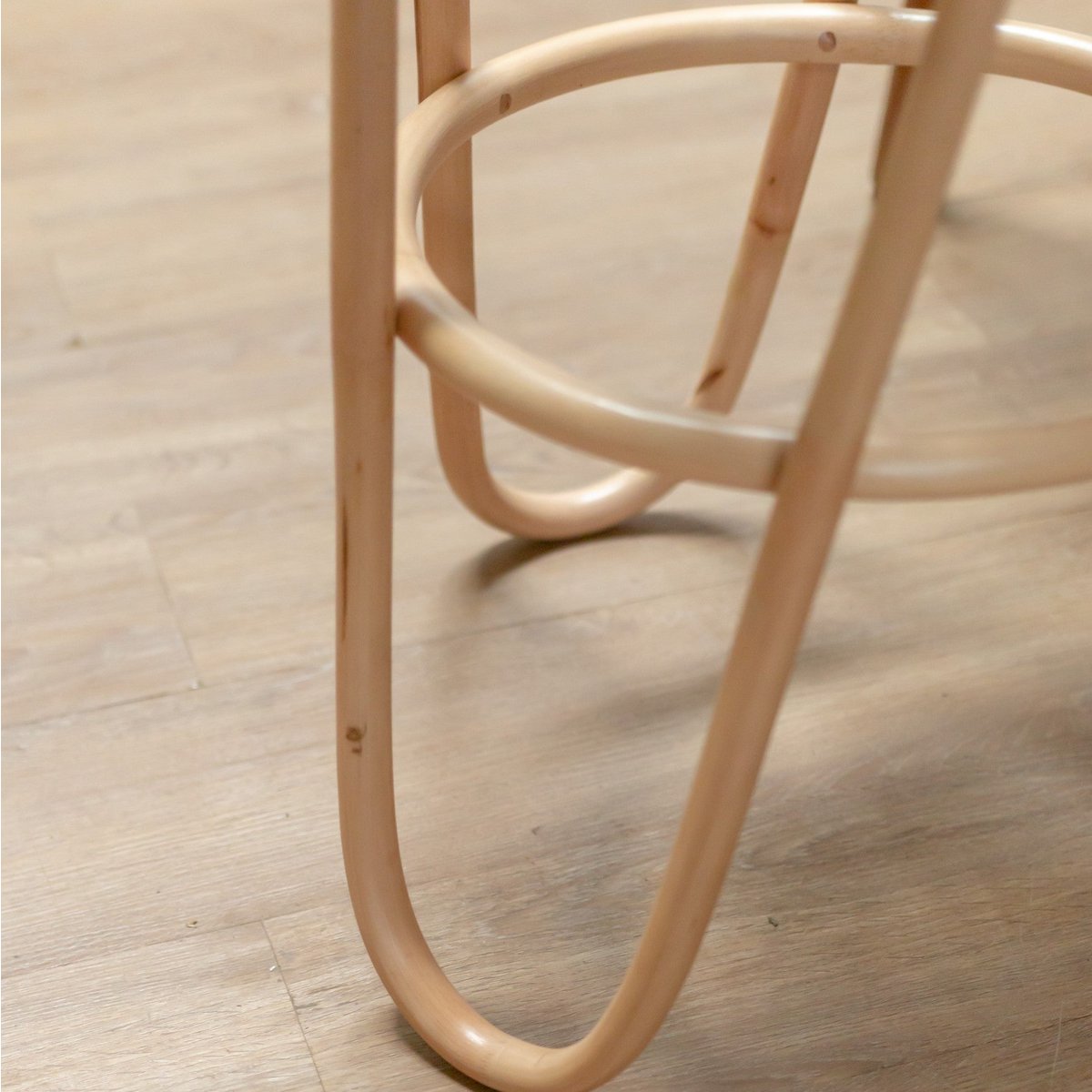 KOLAKA rattan basket stool used as boho decorative seat