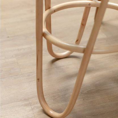 KOLAKA rattan basket stool used as boho decorative seat