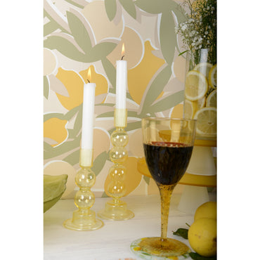 bright lemon glass coaster adding color to dining setup