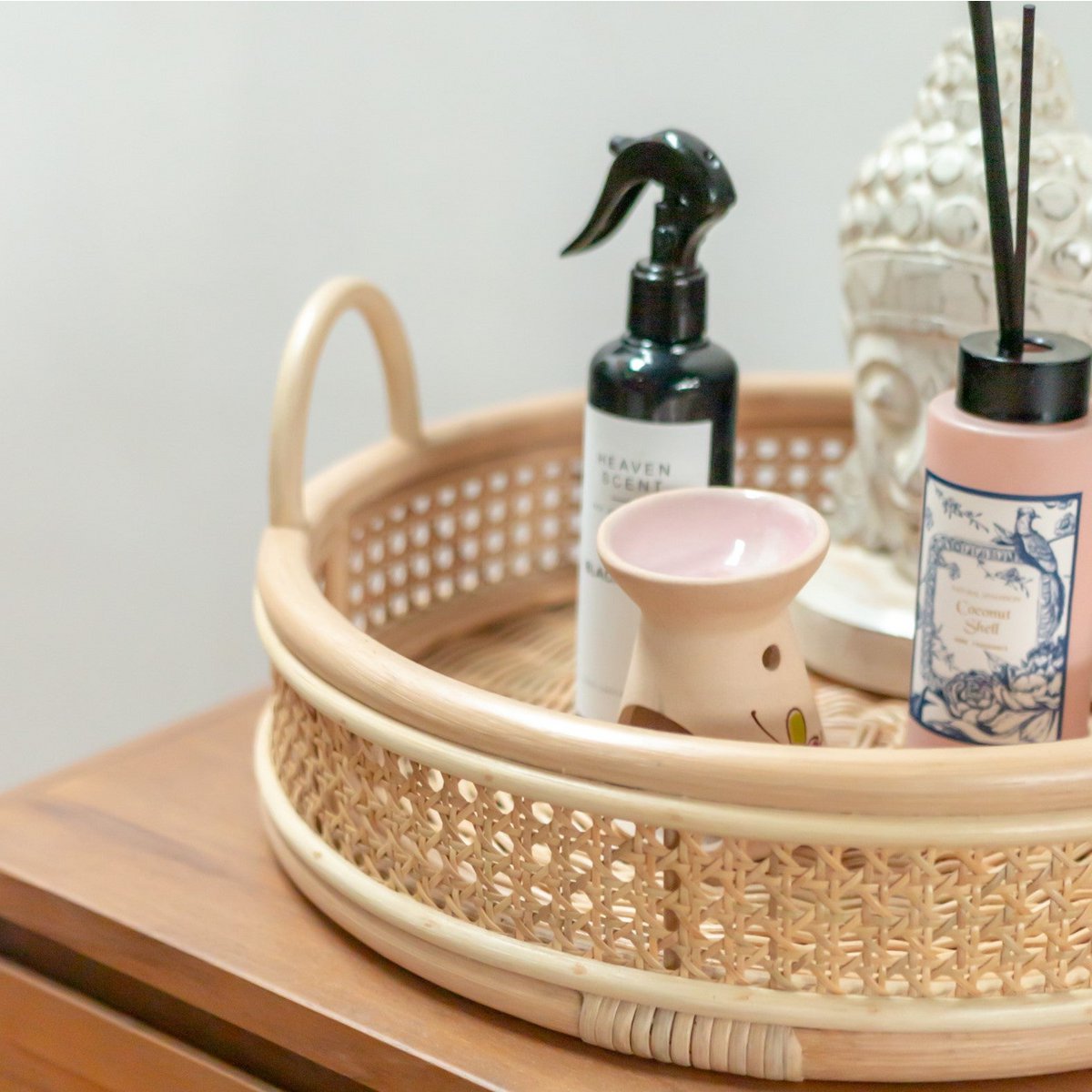 NEIRA round rattan basket tray adding natural charm to home setting