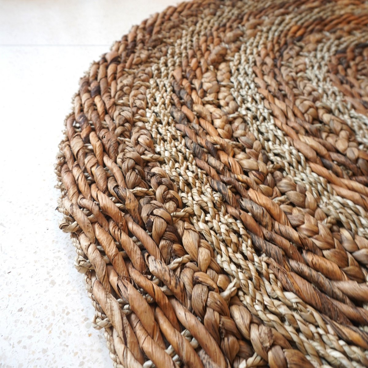 Pohon banana fibre basket rug with earthy beige brown tones