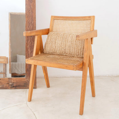 Raffia basket pillow for boho seating and interior styling