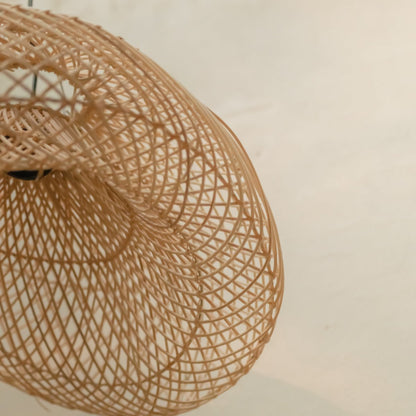 CozyVibe Padma rattan lamp styled in cozy home décor