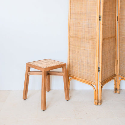 SUBANG rattan basket stool used as decorative seat or side table